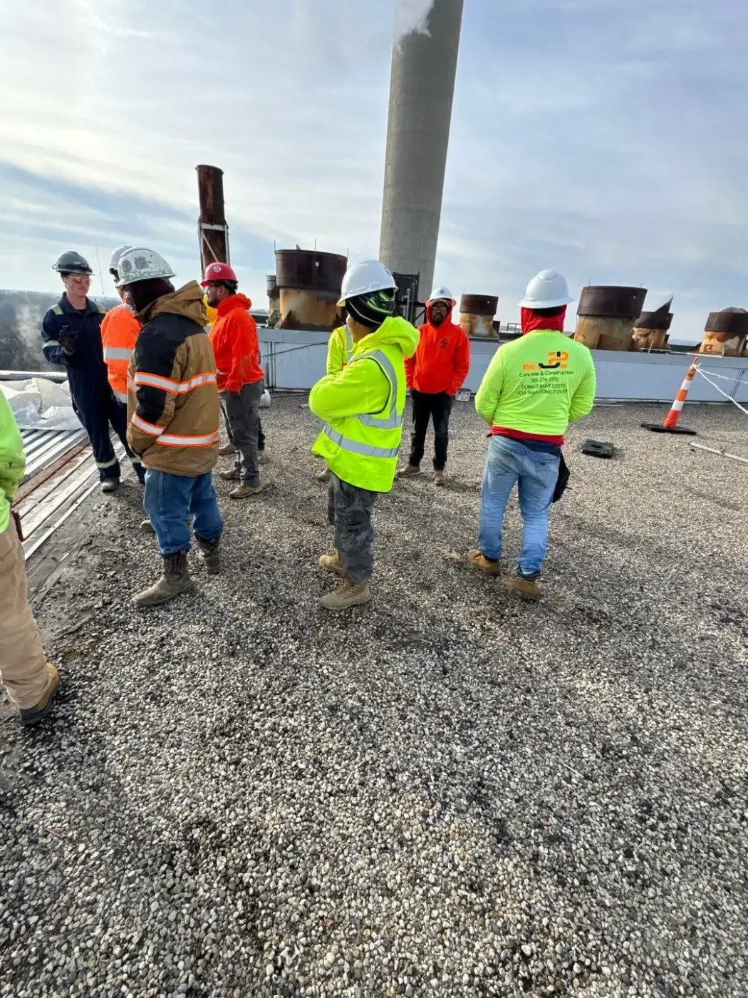 Tarping and dry-in on a Ingalls commercial roof